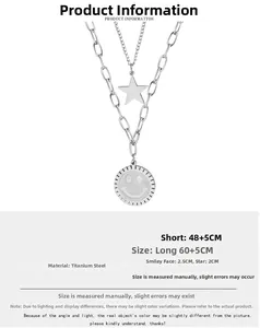 Detail of double-layer titanium steel necklace with star and smiley face pendants