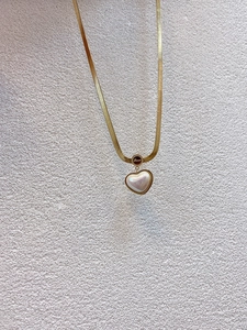 Golden snake chain necklace with Love engraving and heart-shaped mother of pearl pendant
