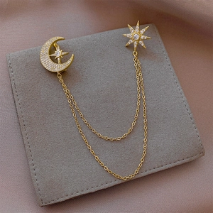 Elegant gold crescent moon and star brooch with sparkling zircon and double chains