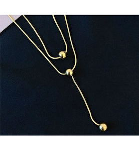 Double-layered gold snake chain necklace with three polished bead pendants for women