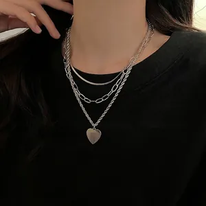 Layered titanium steel heart pendant necklace with snake and paperclip chain style