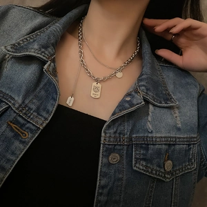 Double-layered tiger tag necklace in silver titanium steel featuring Brave 520 engraving