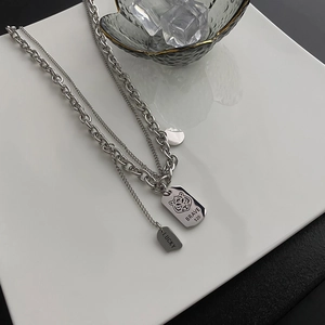 Double-layered silver titanium steel tiger tag necklace with Brave 520 and Lucky engraving