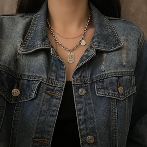 Double-layered silver titanium steel necklace featuring tiger tag and brave engraving