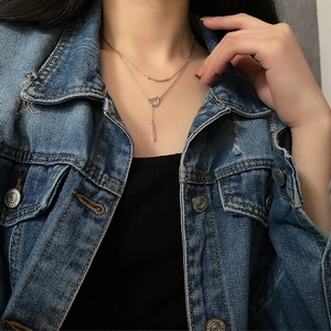 Collier double épaisseur en argent avec pendentif sourire et breloque en lettre D