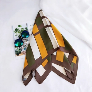 70cm geometric silk scarf with yellow and green color blocks on white fabric background