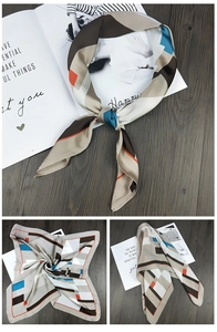 Detailed views of geometric silk square scarf showing folded textures and styling options