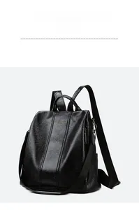 Close-up of black lychee texture backpack featuring golden Fashion and Bags lettering
