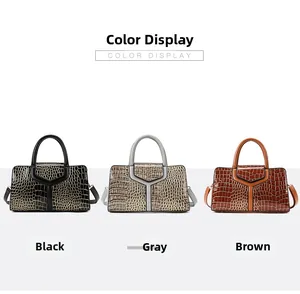 Vue détaillée des sacs à main en relief croco noir, gris et marron avec surpiqûres en cuir en Y