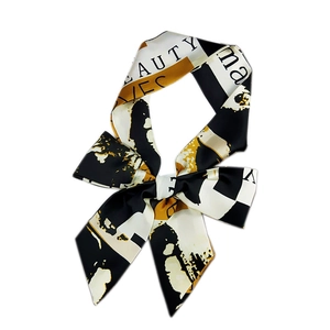Narrow silk twilly scarf with black and yellow abstract ink pattern and beauty typography