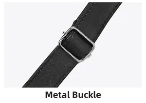 Detail of adjustable silver buckle on black lychee textured leather shoulder strap