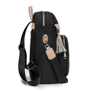 Sac à dos chic en nylon noir pour femme avec finitions en cuir beige et détail gland