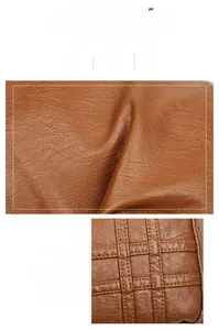 Detail der braunen Ledertasche mit wasserfester Textur und präzisen Nähten