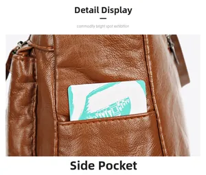 Detail view of brown pebbled leather side pocket with functional card storage