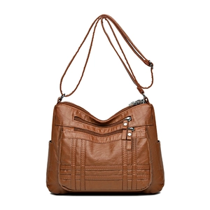 Braune Kunstlederhandtasche mit mehreren Taschen, verstellbarem Riemen und Struktur