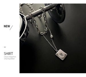 Detail of silver double-layer titanium necklace with square coin portrait pendant