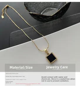 Detail of gold titanium steel necklace with black enamel pendant and size specifications