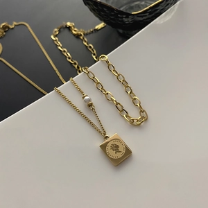 Double-layered gold titanium steel necklace with Queen Elizabeth II coin and pearl accent