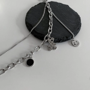 Double-layered titanium steel necklace with cute bear and black disc pendant for women