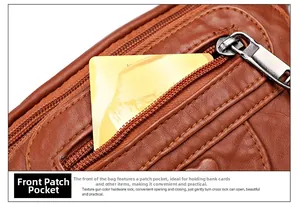 Detail of front zipper pocket on brown leather waist bag showing card storage capacity