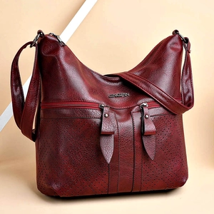 Grand sac à main bordeaux en similicuir avec motifs ajourés au laser et logo en métal