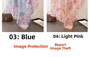 Detail of floral silk scarves in blue and light pink with elegant glossy texture