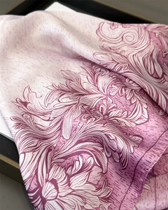 Close-up of vintage baroque floral pattern on purple and pink silk satin scarf