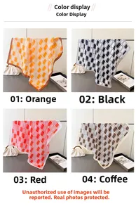 Detail of geometric diamond pattern silk square scarves in four elegant color options