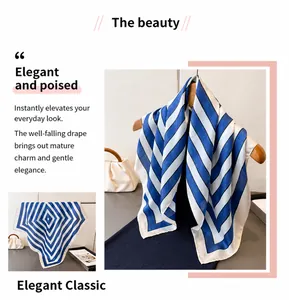 Detail of blue and white striped faux silk scarf draped elegantly on a wooden hanger