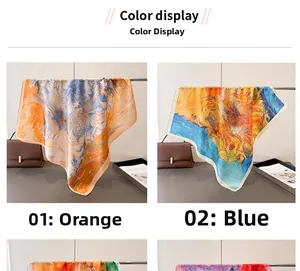 Détail de foulards en soie avec imprimé tournesol en tons orange et bleu artistique