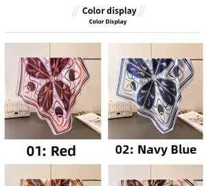 Detail of red and navy silk scarves with elegant chain and rope prints in a chic layout