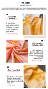 Detailed view of the soft faux silk fabric texture and vibrant orange printed pattern