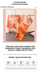 Detail view of square gradient satin scarf showing 70cm size and soft geometric pattern