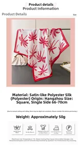 Detailed view of red coconut tree print silk-like satin square scarf with washing instructions
