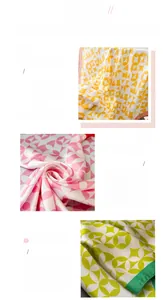 Detail of colorful geometric print scarves showing silky texture and finished edges