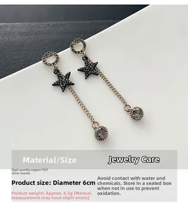 Detail of star tassel earrings with black rhinestones and 925 silver needles