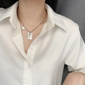 Chic silver titanium steel double-layer necklace with rectangular engraved pendant on model