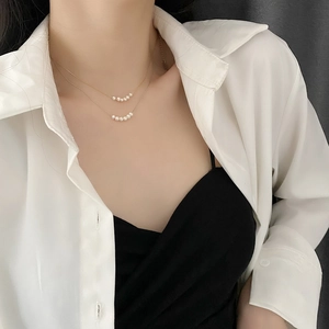 Elegant double-layered titanium steel necklace with natural freshwater pearls for women
