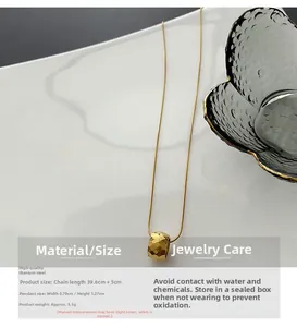 Detail of titanium steel gold necklace with hammered cylinder pendant and size measurements
