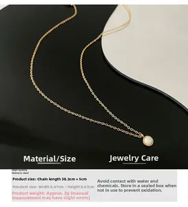 Detail of gold titanium steel necklace with white opal pendant and size parameters