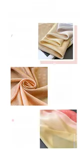 Detail of silk-like scarf featuring champagne gradient polka dots and geometric textures