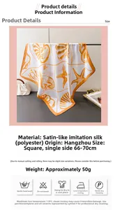 Detail of silk satin scarf featuring orange ocean patterns like mermaids and starfish