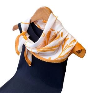 Elegant beach silk scarf with yellow floral print on white satin, lightweight beach shawl