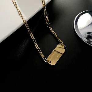 Gold paperclip curb link chain necklace with engraved rectangle pendant for women
