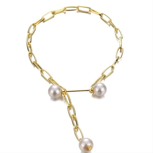 Elegant gold Y-shaped necklace with white pearls and textured paperclip chain design
