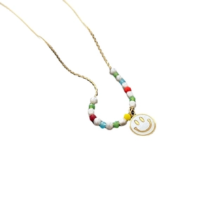 Colorful beaded necklace with golden chain and smiling face pendant for women