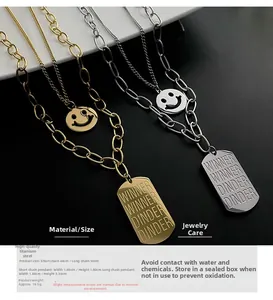 Close-up of double-layer titanium steel necklace with smiley face and rectangle pendant