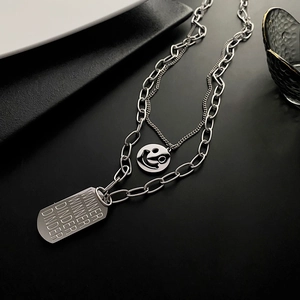 Double-layer stainless steel sweater necklace with smiley face and winner tag pendants