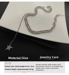Detail of chunky titanium steel star necklace with size measurements and punk styling