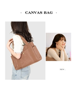 Détail du sac cabas en toile montrant la poche latérale, la boucle et la couture renforcée